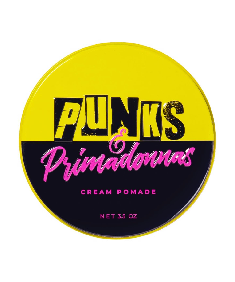 Top view of pink pomade container with yellow and black Punks & Primadonnas logo